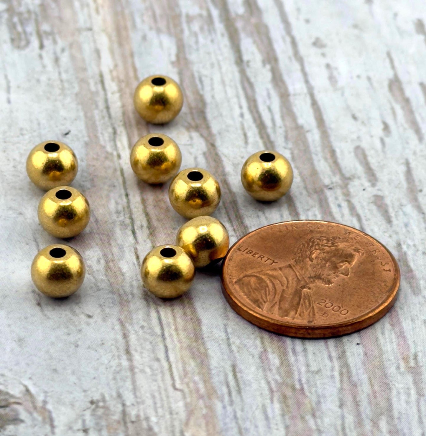 Perles rondes en métal de 6 mm (paquet de 10), plaquées or 18 carats antique - AG550