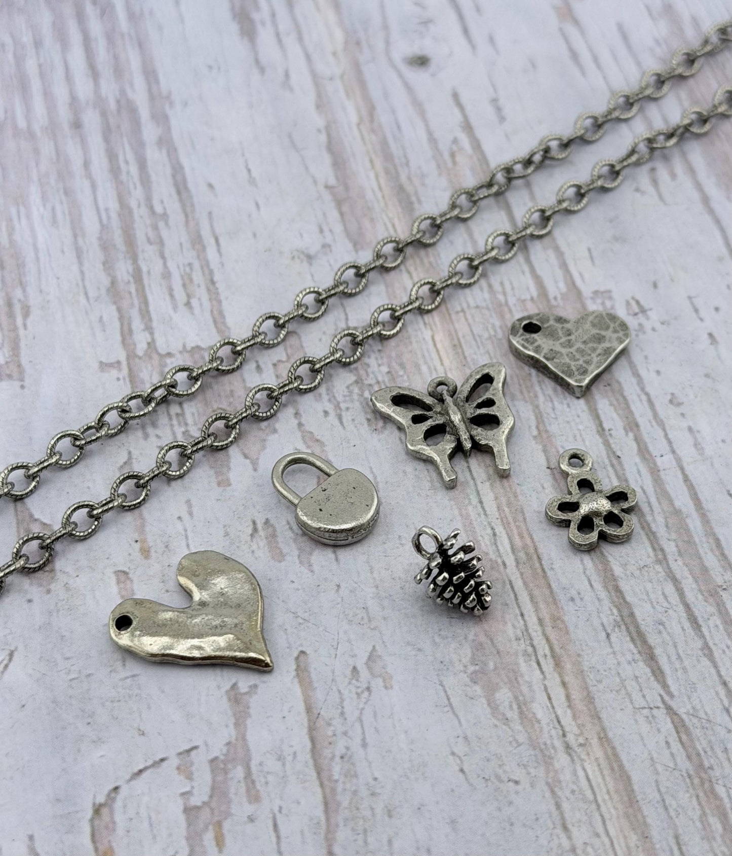 Tiny Silver Flower Charm, Antiqued Pewter - PT633